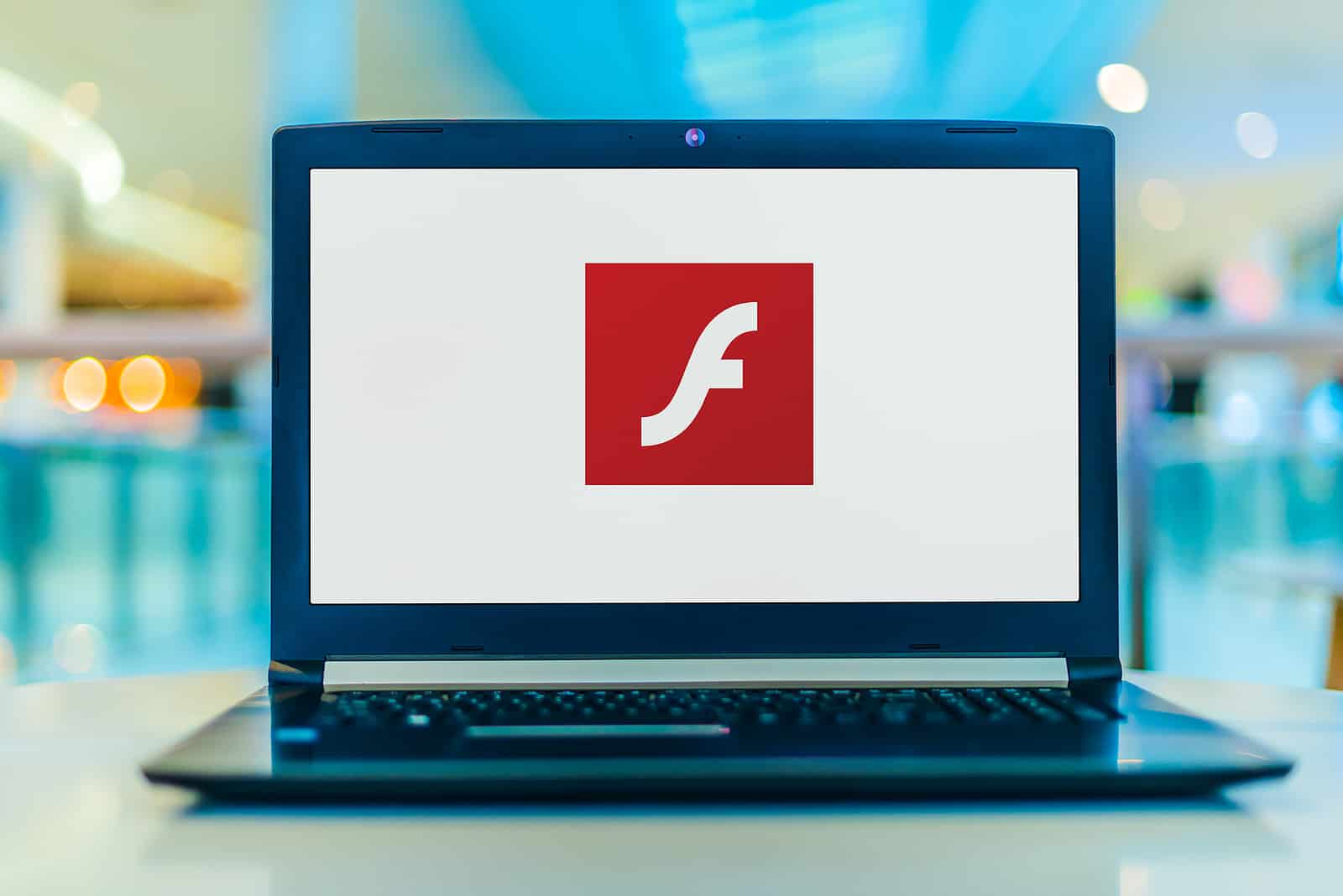 Laptop computer displaying logo of Adobe Flash