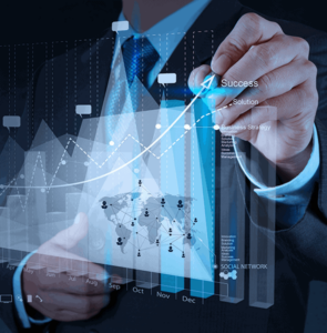 Man in suit drawing a bar graph to illustrate what ETL is and why is it important