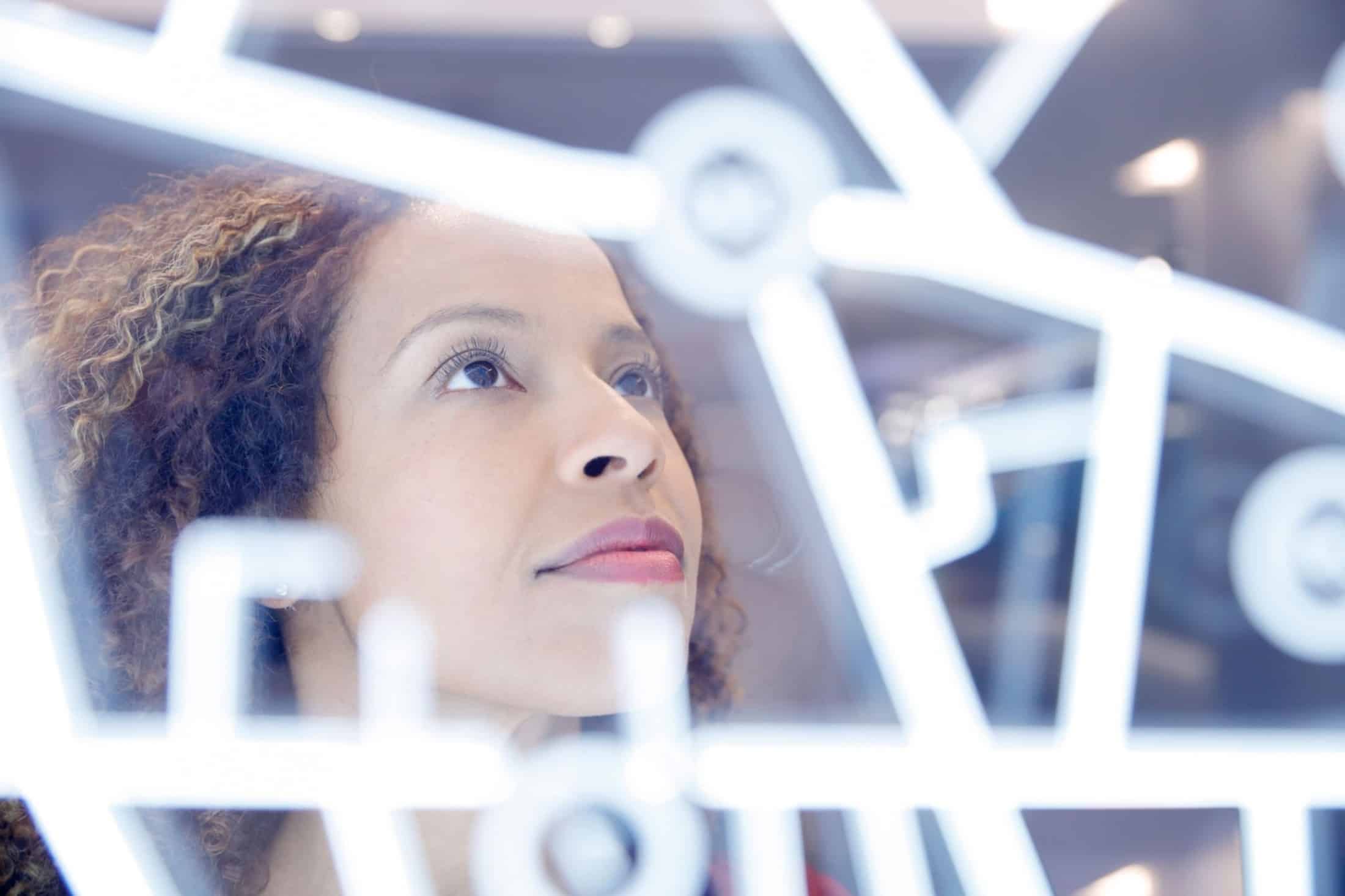 woman looking at data gaining confidence in the cloud